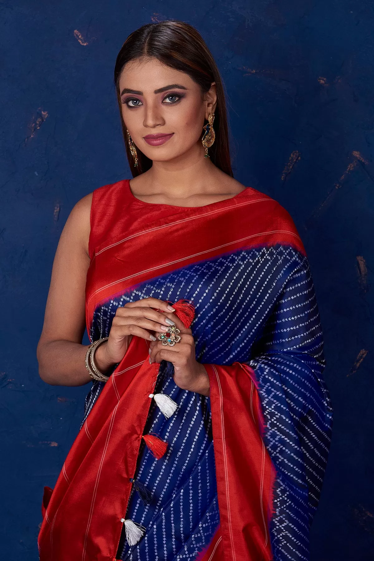 90M220 Royal Blue Ikkat Silk Saree with Red Border