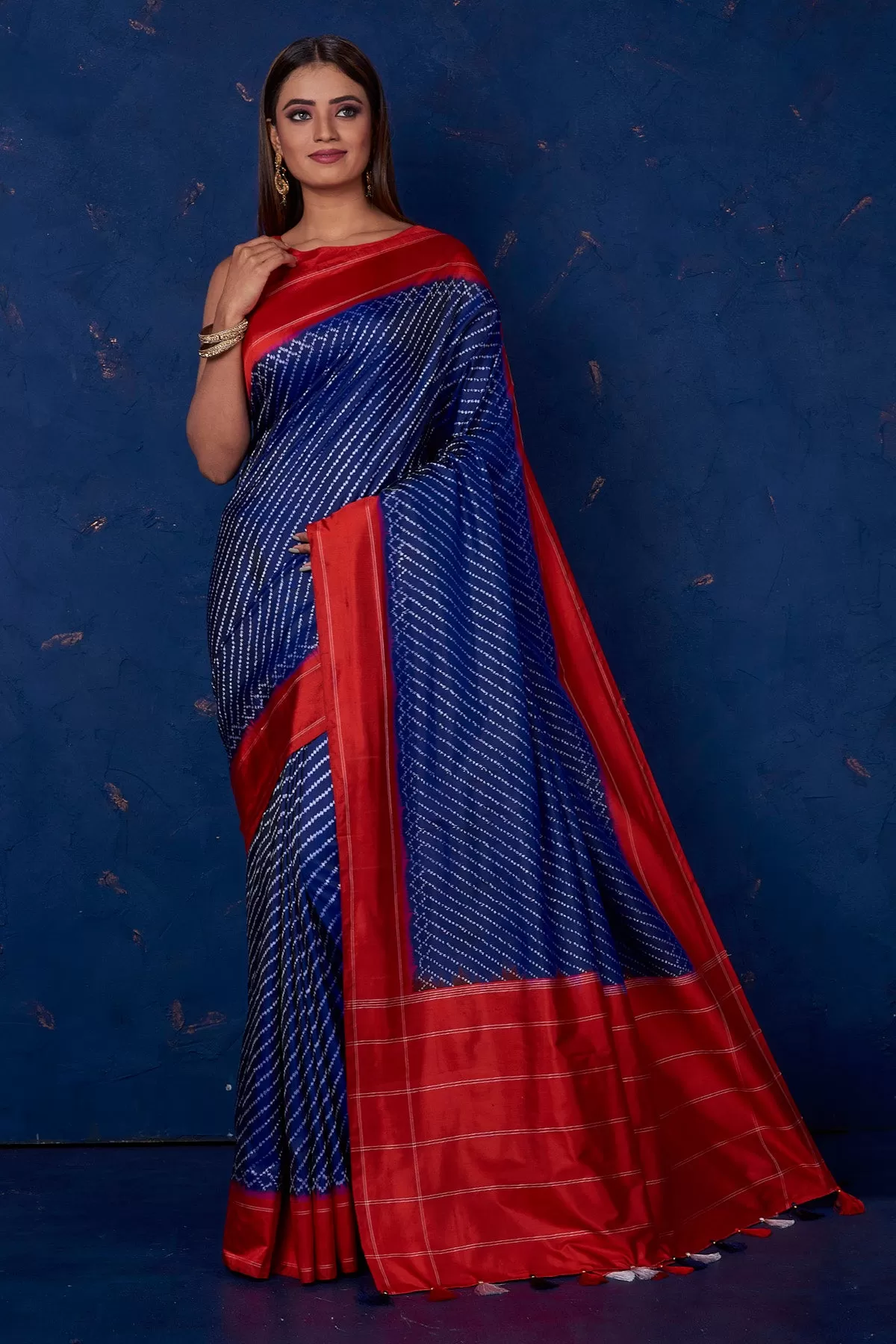 90M220 Royal Blue Ikkat Silk Saree with Red Border