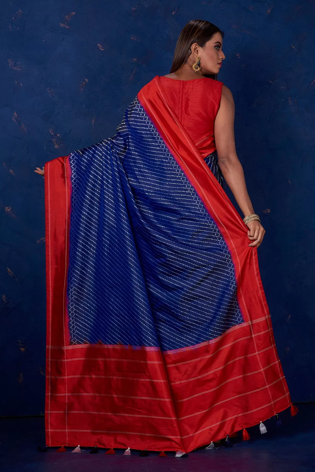 90M220 Royal Blue Ikkat Silk Saree with Red Border