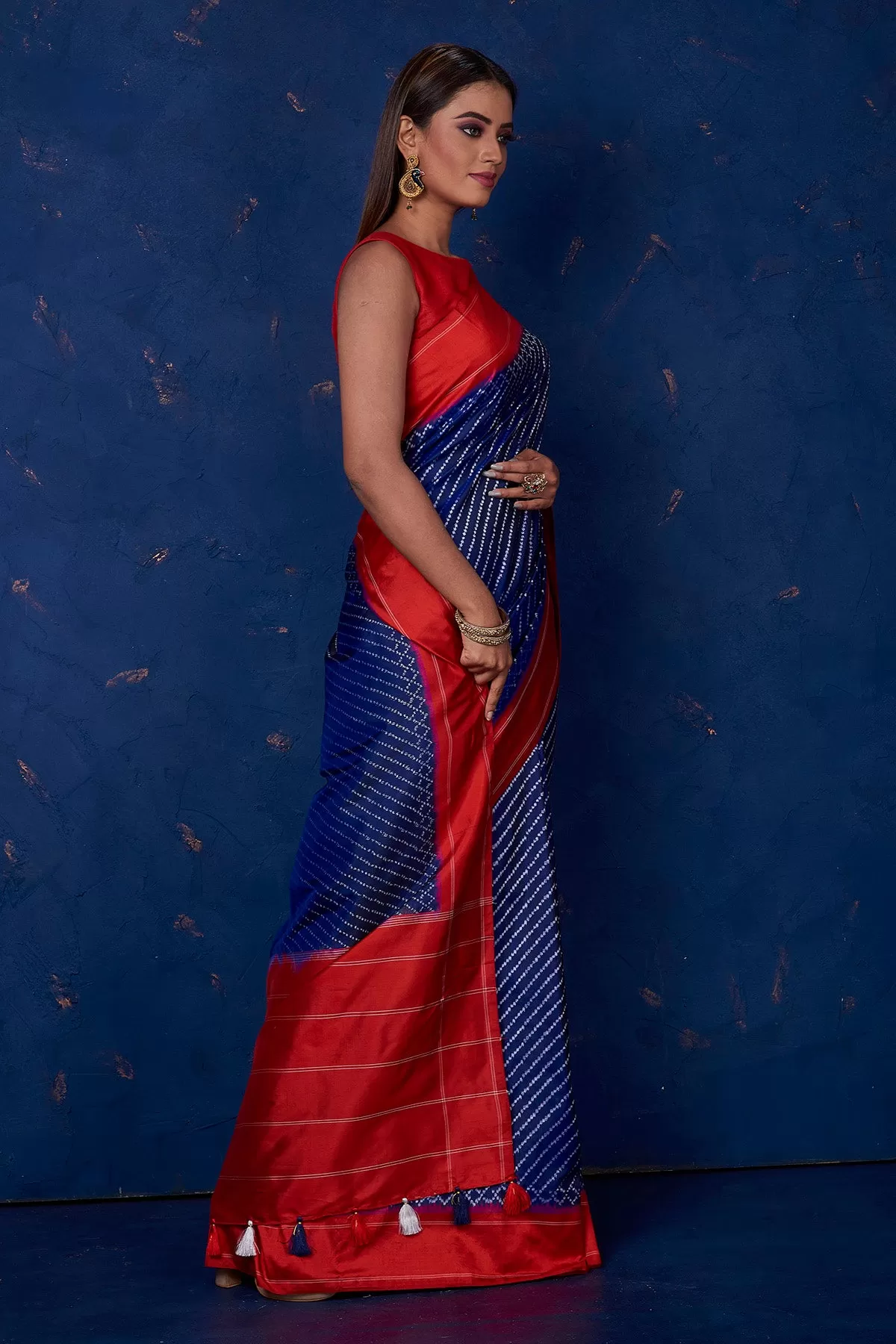 90M220 Royal Blue Ikkat Silk Saree with Red Border