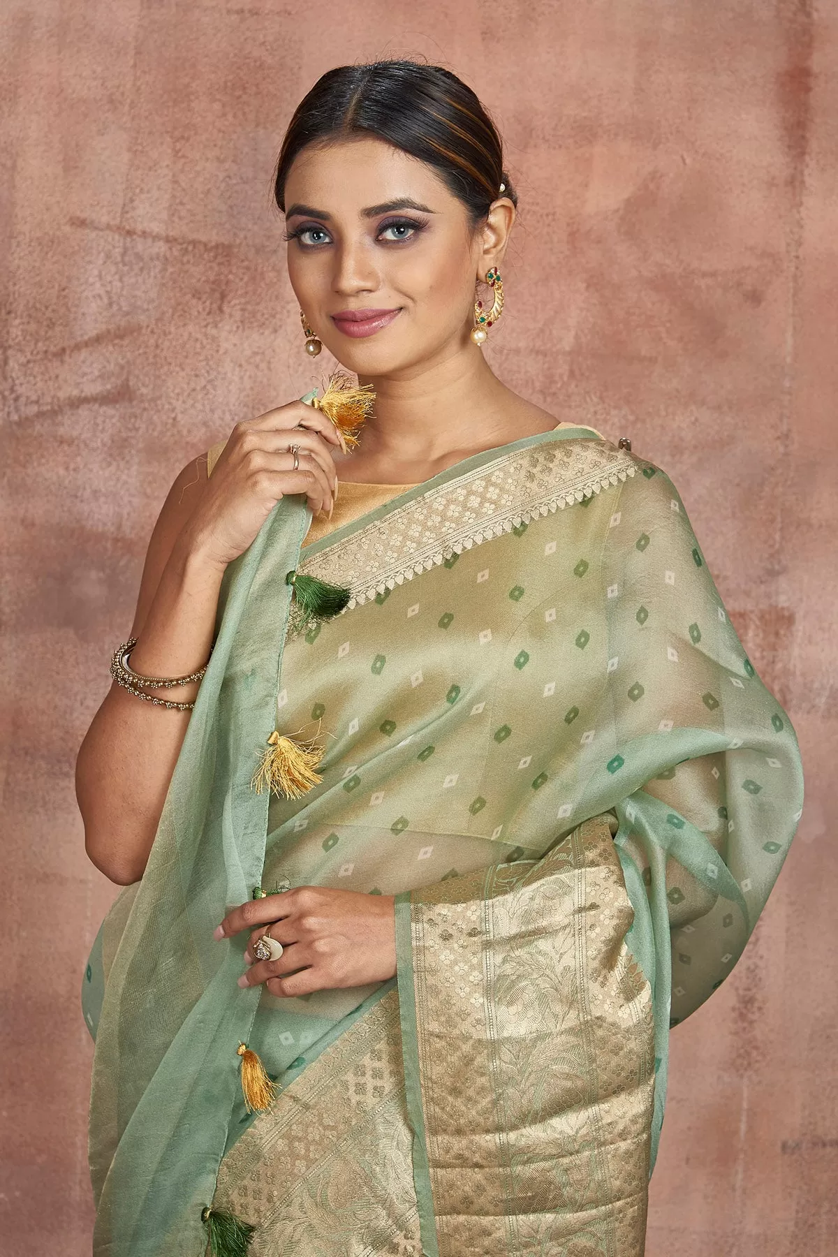 90M366 Light Green Bandhej Organza Sari with Golden Border