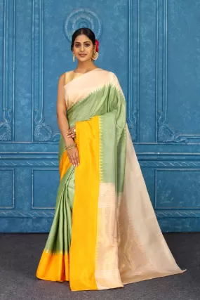 91A461 Pista Green Gadhwal Silk Saree with Peach and Yellow Border